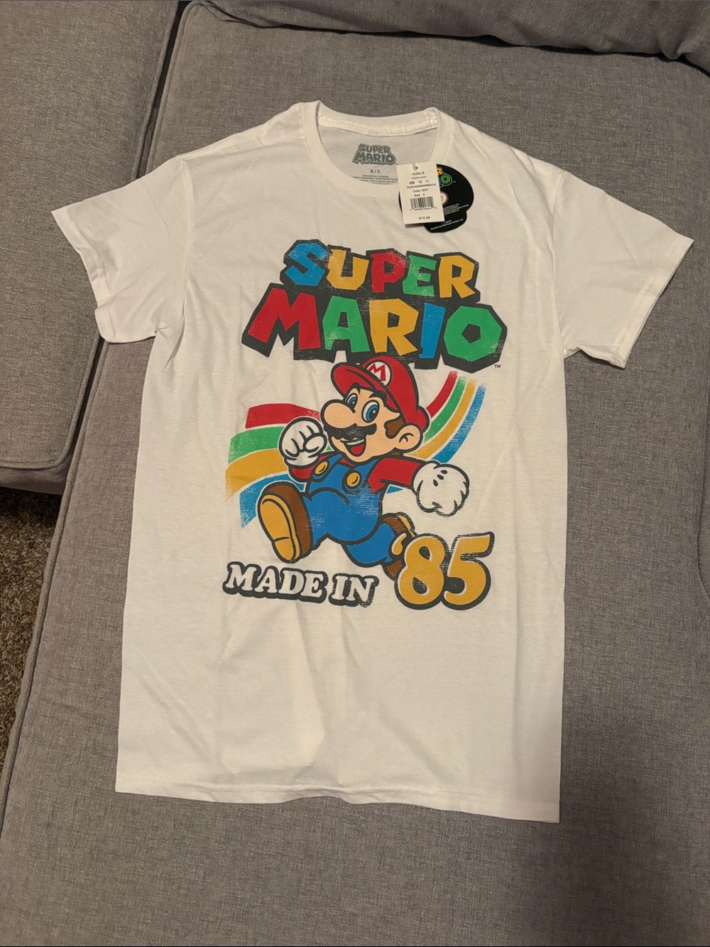 Nintendo White Super Mario Graphic Tee with Red, Blue, Yellow, Green Accents NWT